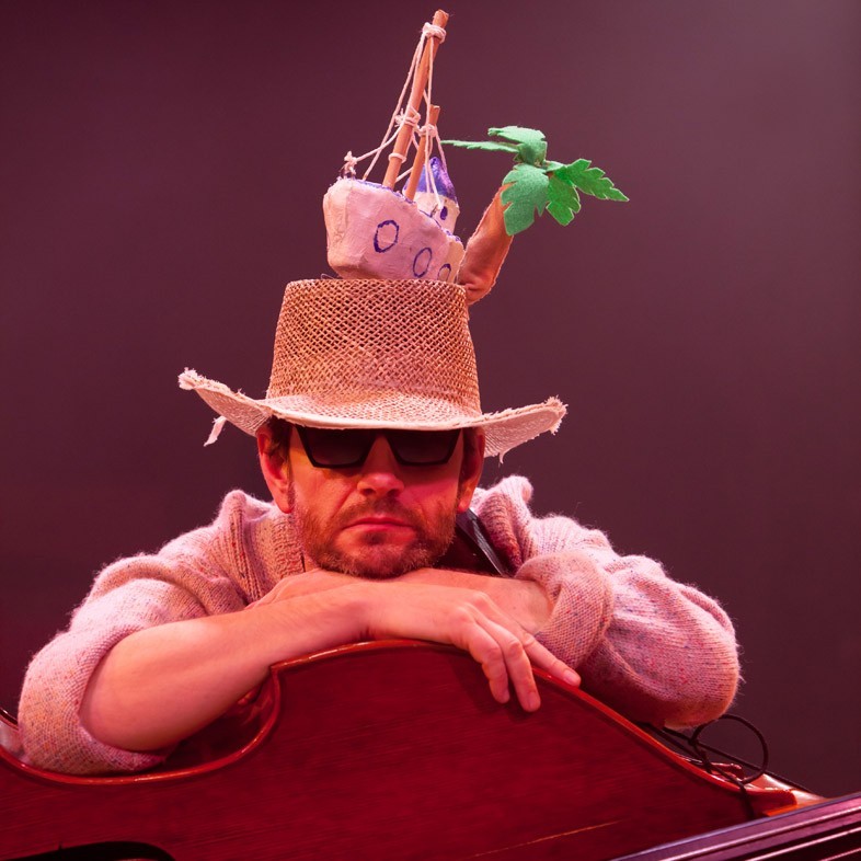 Alex Vann as a whale and an island