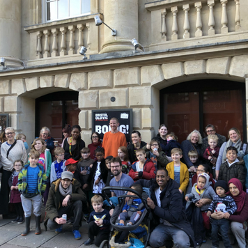 Children and families enjoying a free trip to the theatre to enjoy our production of Boing! at Bristol Old Vic