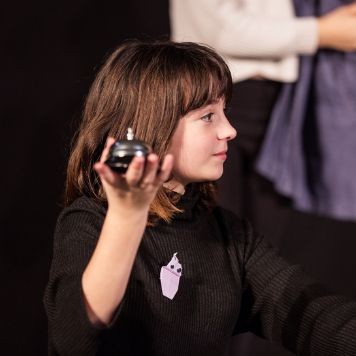 An image of Ada performing at Travelling Light's Youth Theatre Showcase in March 2020.