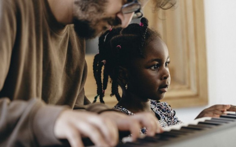 An artist and child collaborating during our R&D session for a new early years show.