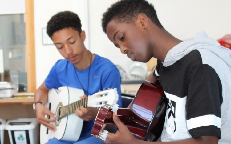 Two students who completed their Arts Award with Travelling Light.