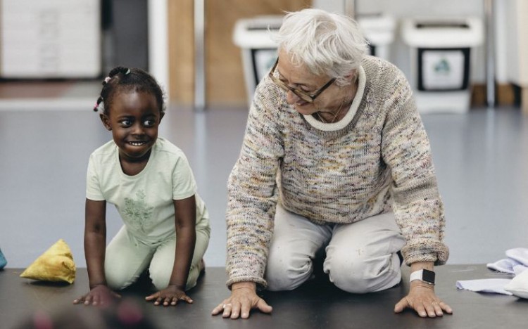 A child and artist taking part in our early years R&D. Photo by Edward Felton.