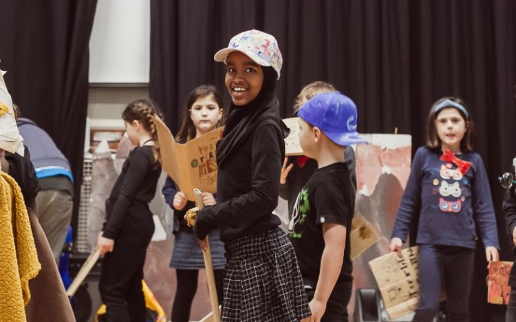 Pupils performing in 'The Terrific Mesolithic' in 2023.