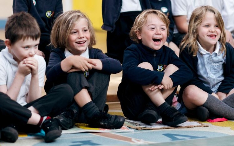 Pupils watching a performance of When The Birds Sang.