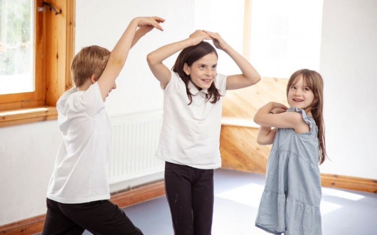 3 members of our youth theatre taking part in a session. Photo by Camilla Adams.